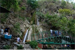 group-people-enjoying-under-famous-neer-garh-waterfall